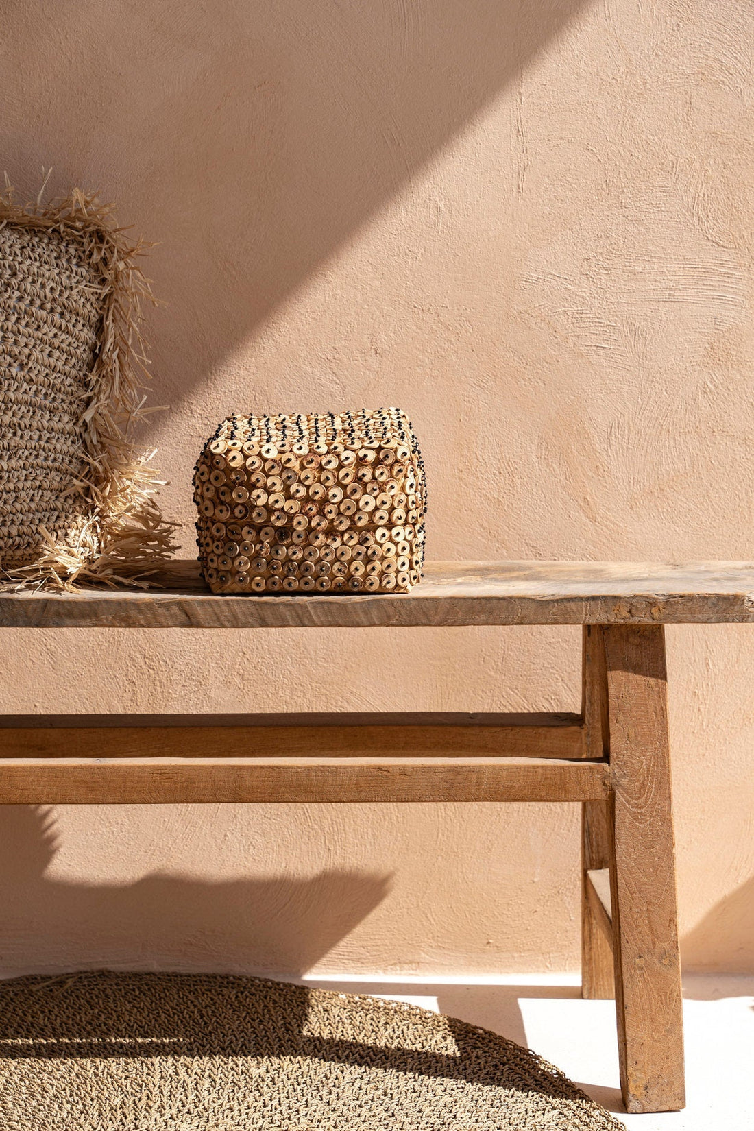 Natural coconut shell basket with handcrafted boho decor in lifestyle setting